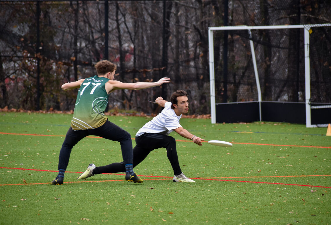 Students playing ultimate frisbee